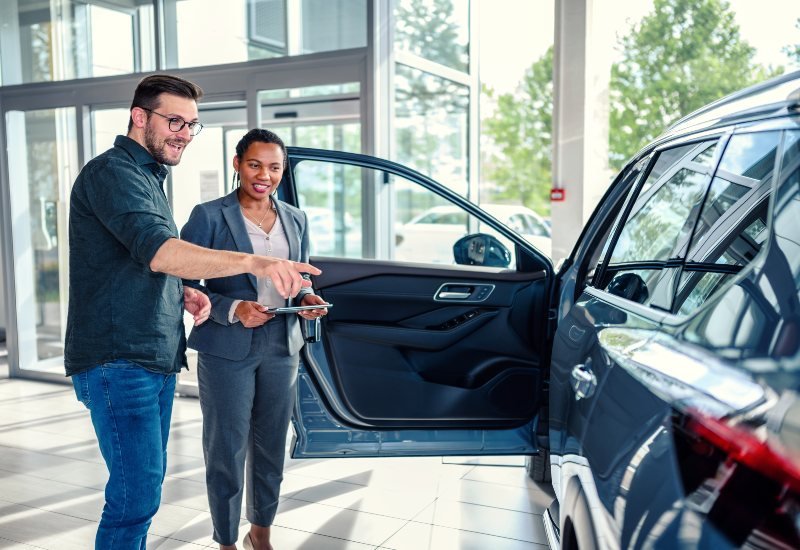 Auto dealer insurance coverage provider showing a car in the Grand Junction area